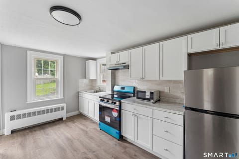 Tiny photo for 76 Rockville Road, East Windsor, CT 06016 (MLS # 24197717)