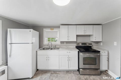 Tiny photo for 76 Rockville Road, East Windsor, CT 06016 (MLS # 24197717)