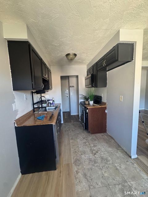 Photo of 250 N Bishop Avenue #APT 19, Bridgeport, CT 06610 (MLS # 24145690)