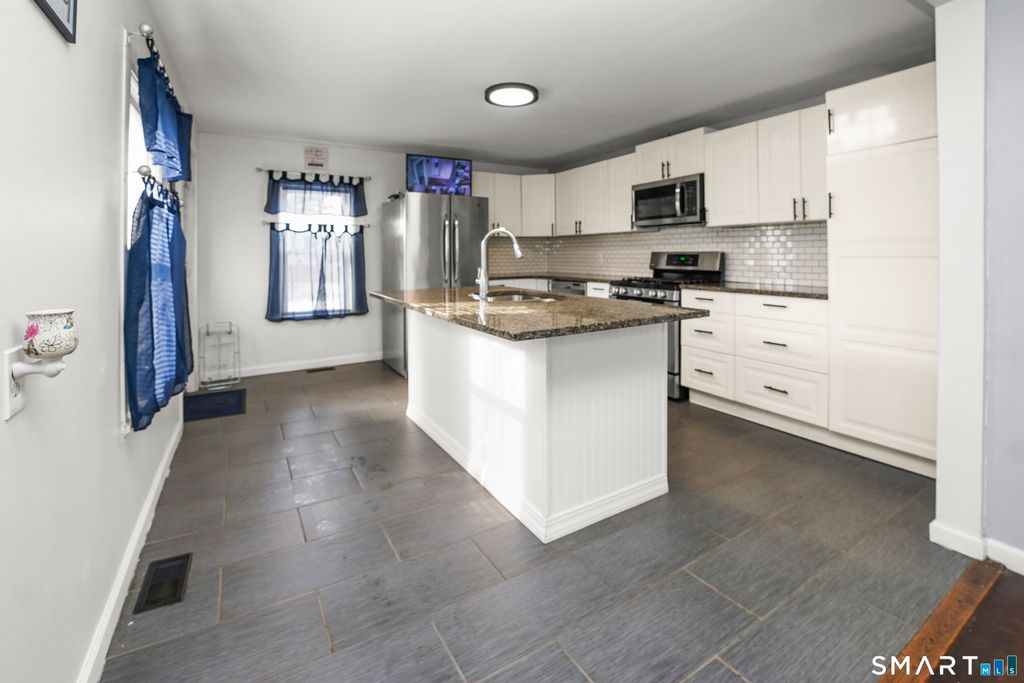 Photo of 17 Windsor Street, Enfield, CT 06082 (MLS # 24143916)