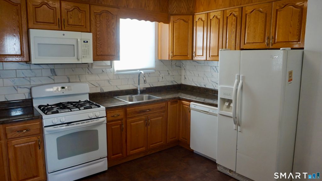 Photo of 154 Lockwood Avenue, Stamford, CT 06902 (MLS # 24153098)