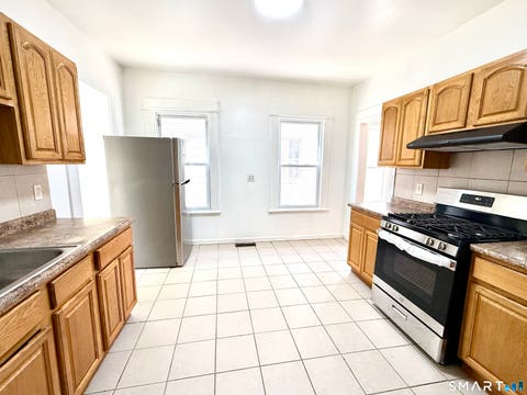 Photo of 202 Sixth Street #1st Fl, Bridgeport, CT 06607 (MLS # 24189909)