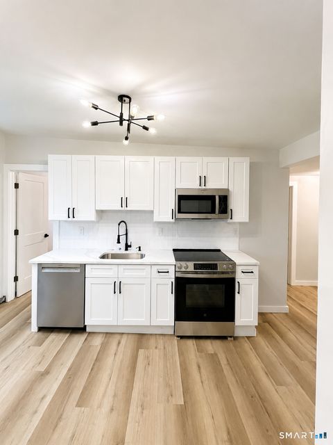 Photo of 411 N Main Street #15, Bristol, CT 06010 (MLS # 24175538)