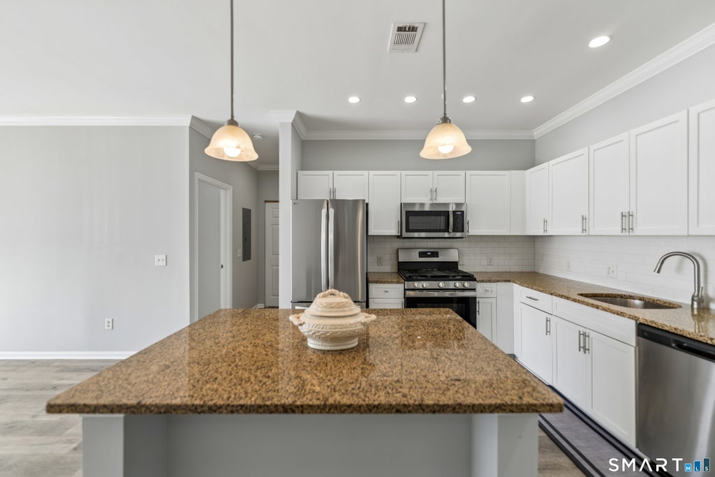 Photo of 850 E Main Street #409, Stamford, CT 06902 (MLS # 24216838)