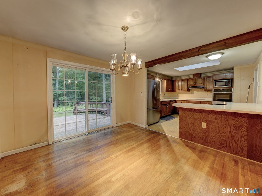 Photo of 18 Saint Francis Woods Road, Madison, CT 06443 (MLS # 24204341)