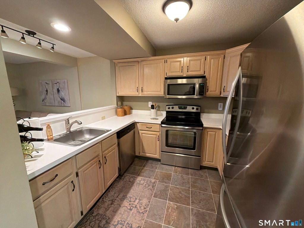 Photo of 41 Millville Avenue #106, Naugatuck, CT 06770 (MLS # 24205809)