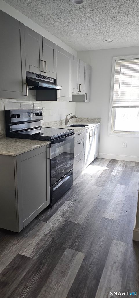Photo of 315 Grove Street, Meriden, CT 06451 (MLS # 24172958)