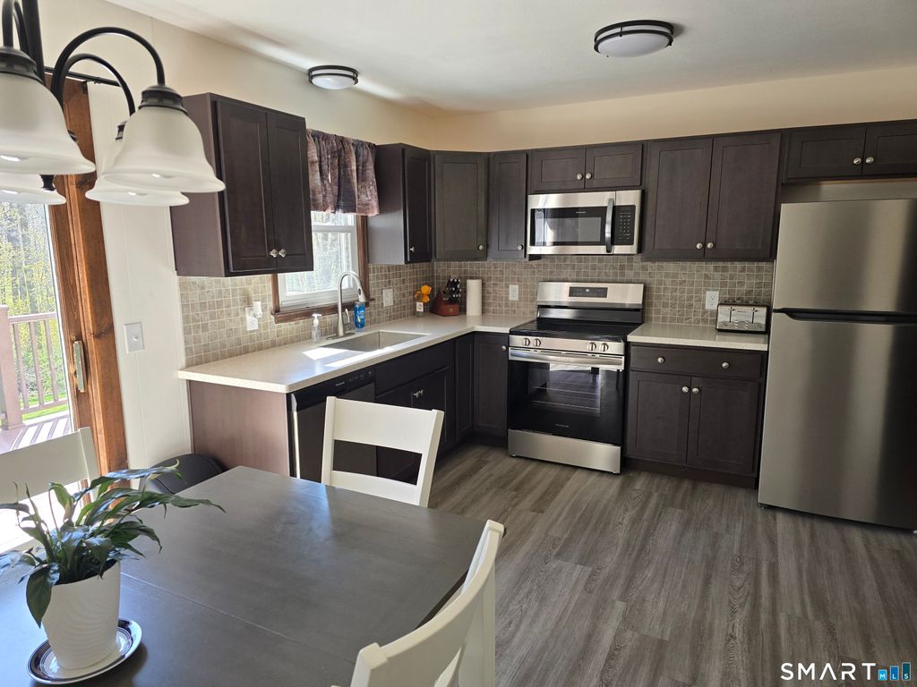 Photo of 163 Rossi Road, Torrington, CT 06790 (MLS # 24170531)
