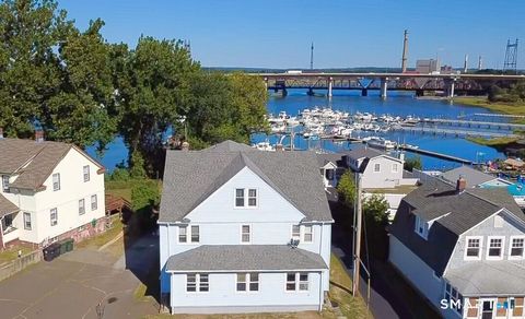 Photo of 26 Bridgeport Avenue, Milford, CT 06460 (MLS # 24156284)