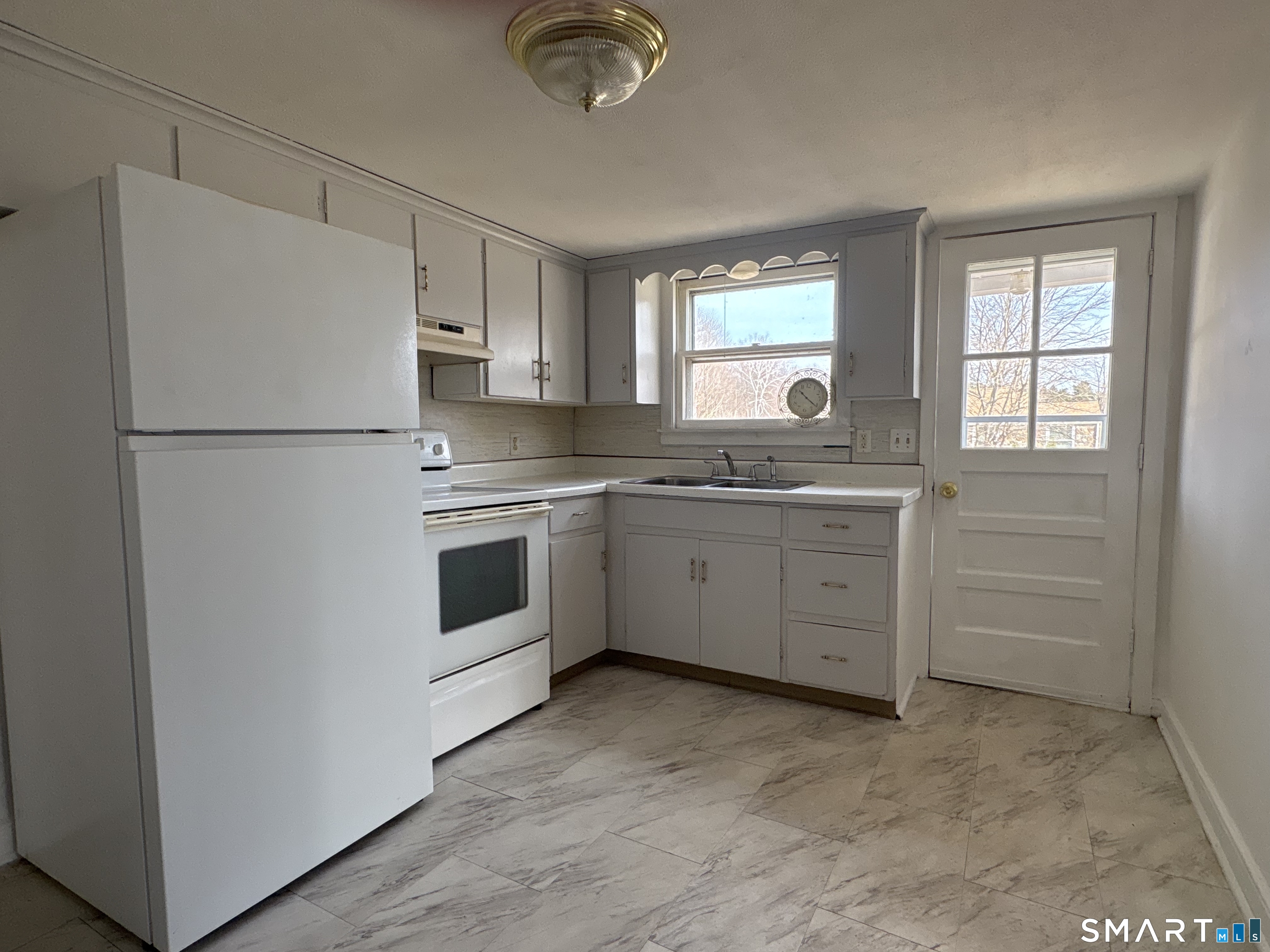 107 North Main Street First floor by driveway