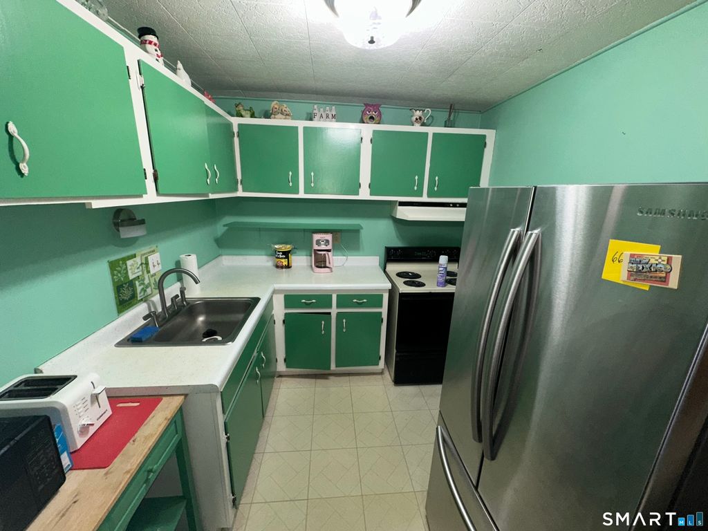 Photo of 308 Meadowside Road #APT 311, Milford, CT 06460 (MLS # 24147693)