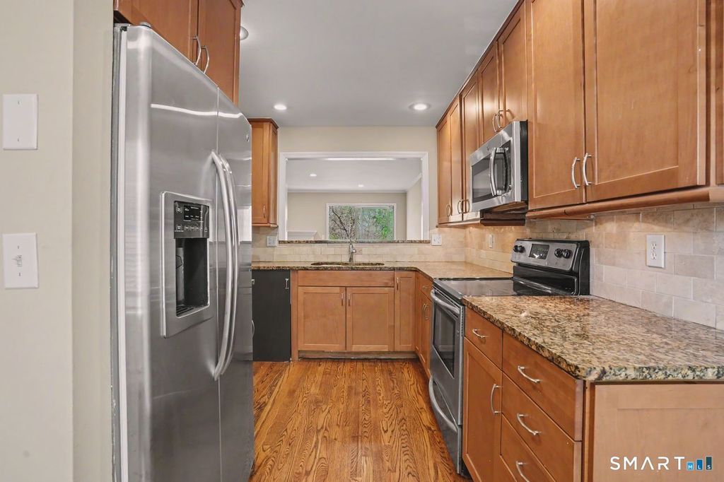 Photo of 20 E Pembroke Road #28, Danbury, CT 06811 (MLS # 24170908)