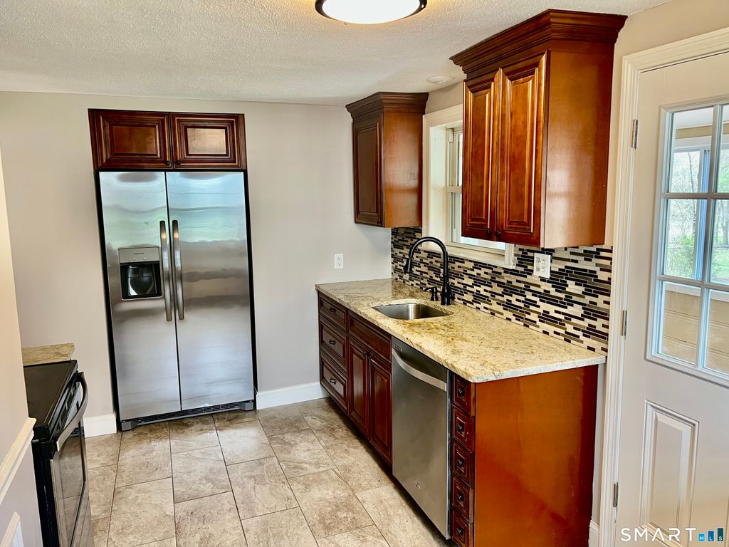 Photo of 72 Hartford Avenue, Newington, CT 06111 (MLS # 24166469)