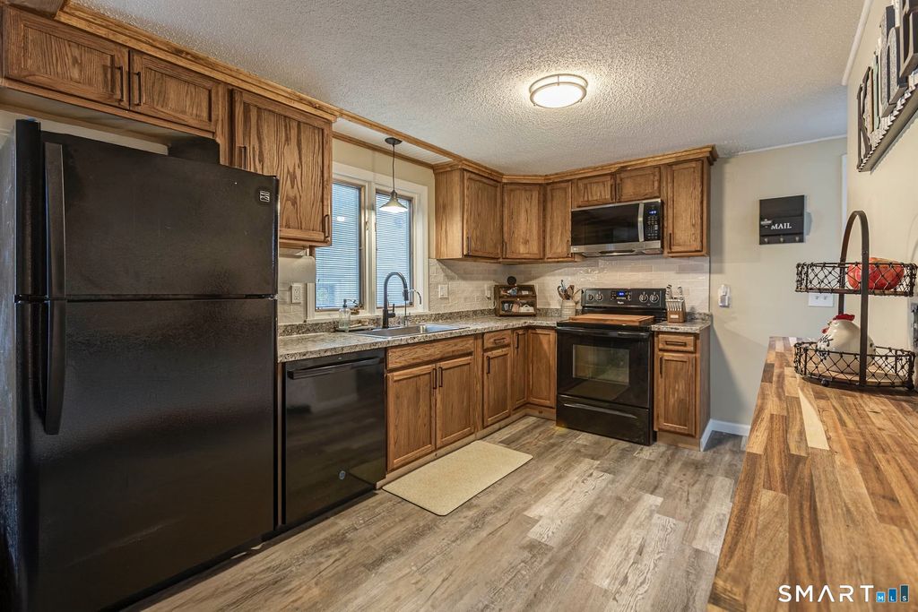 Photo of 90 Goodwin Park Road, Wethersfield, CT 06109 (MLS # 24149555)