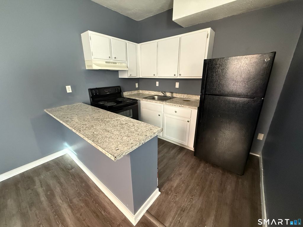 Photo of 31 Wethersfield Avenue #I, Hartford, CT 06114 (MLS # 24148867)