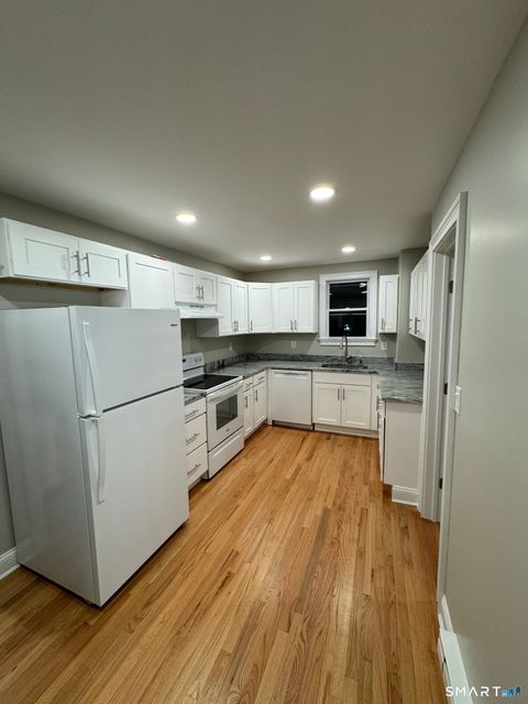 Photo of 403 West Street #1st FL, Bristol, CT 06010 (MLS # 24165415)