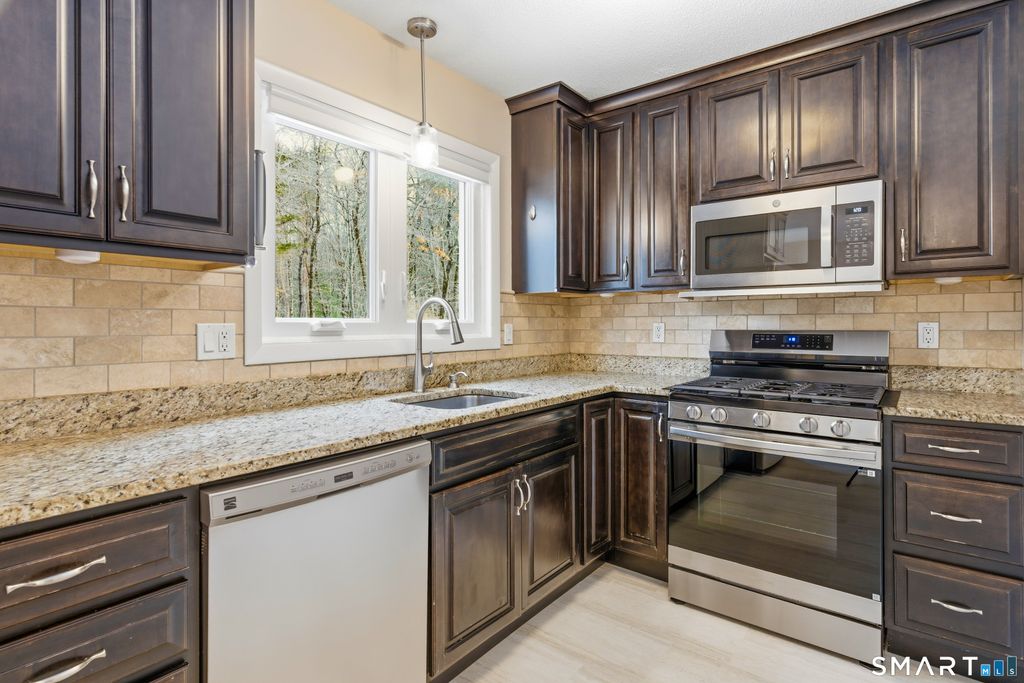 Photo of 443 S Main Street #32, Manchester, CT 06040 (MLS # 24155424)