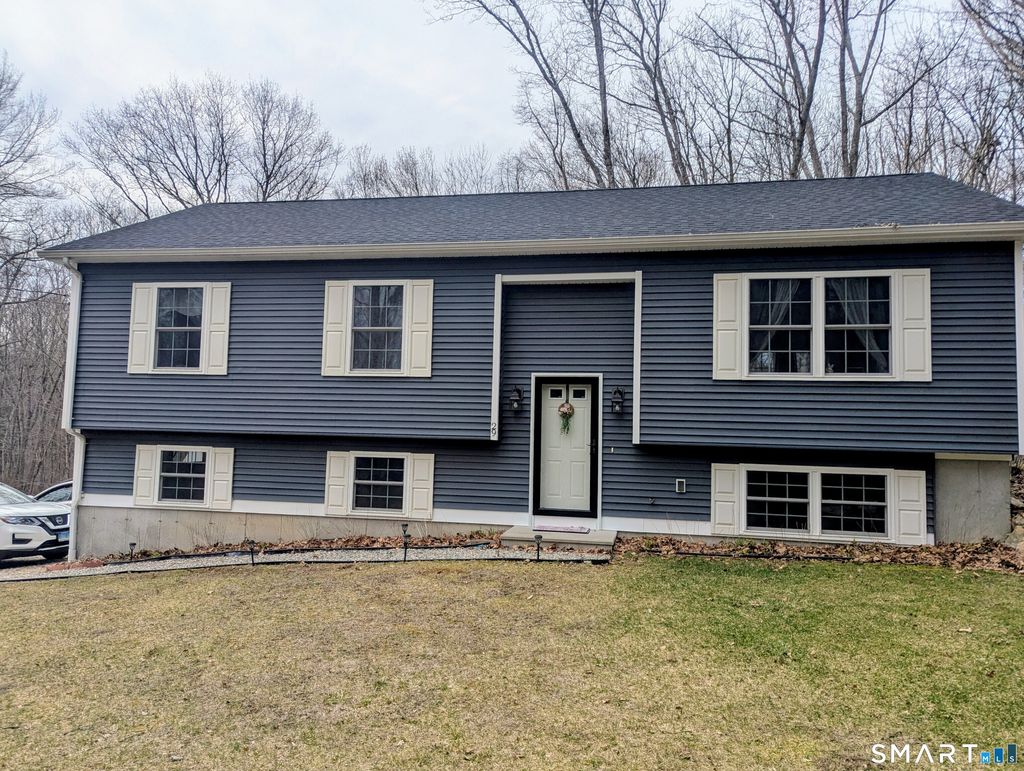 Photo of 29 Tripp Hollow Road, Brooklyn, CT 06234 (MLS # 24163451)