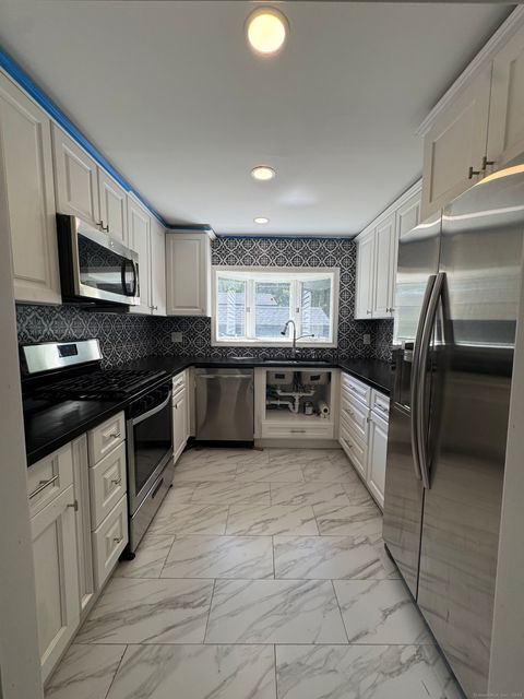 Tiny photo for 81 Riverside Street, Watertown, CT 06779 (MLS # 24137510)