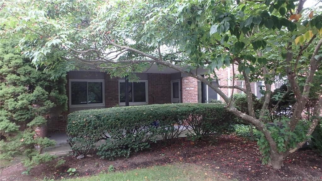 Photo of 20 Southport Woods Drive #20, Fairfield, CT 06890 (MLS # 24123411)