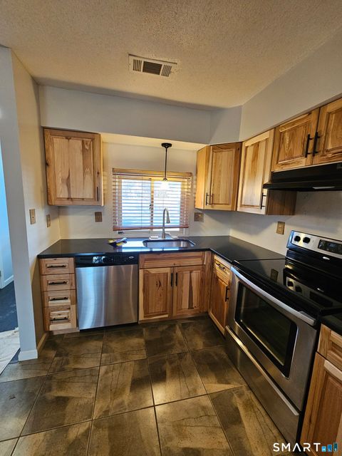 Tiny photo for 155 Redstone Hill Road #102, Bristol, CT 06010 (MLS # 24159851)