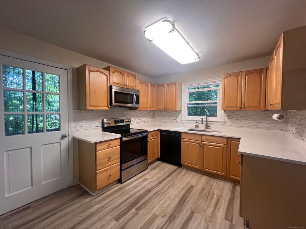 Photo of 11 E Hills Drive #11, New Canaan, CT 06840 (MLS # 24120713)
