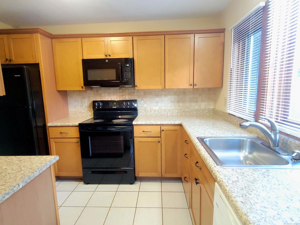 Photo of 44 Tolland Avenue #APT 37, Stafford, CT 06076 (MLS # 24134956)