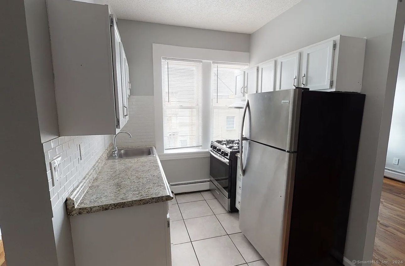 Rental Property at Wells Street 18, Bridgeport, Connecticut - Bedrooms: 2 
Bathrooms: 1 
Rooms: 5  - $1,700 MO.