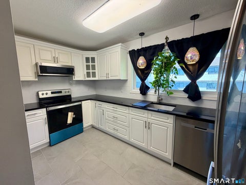 Photo of 27 Crows Nest Lane #18R, Danbury, CT 06811 (MLS # 24213355)