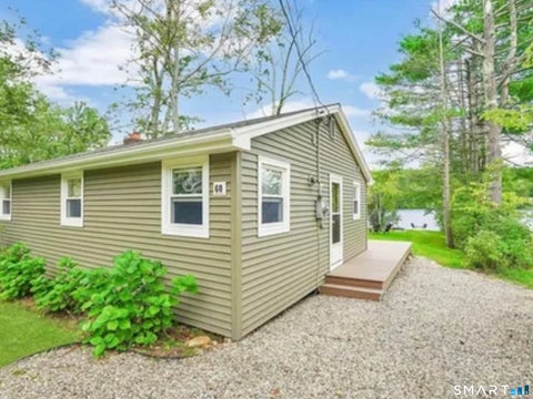 Photo of 60 Ashford Lake Drive, Ashford, CT 06278 (MLS # 24201756)