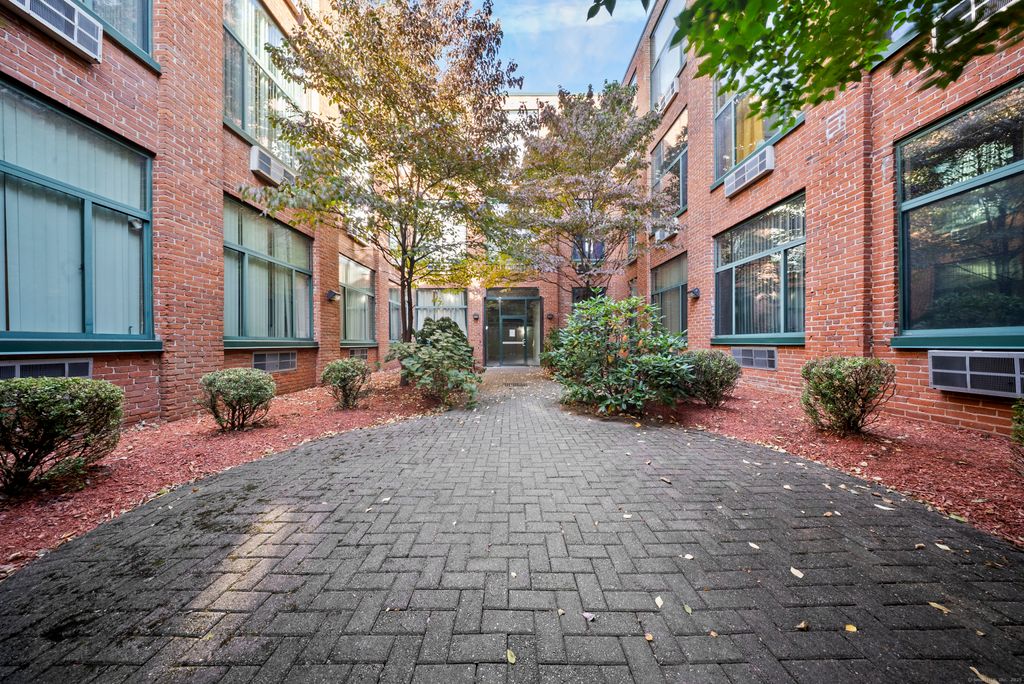 Photo of 390 Charles Street #APT 106, Bridgeport, CT 06606 (MLS # 24136714)