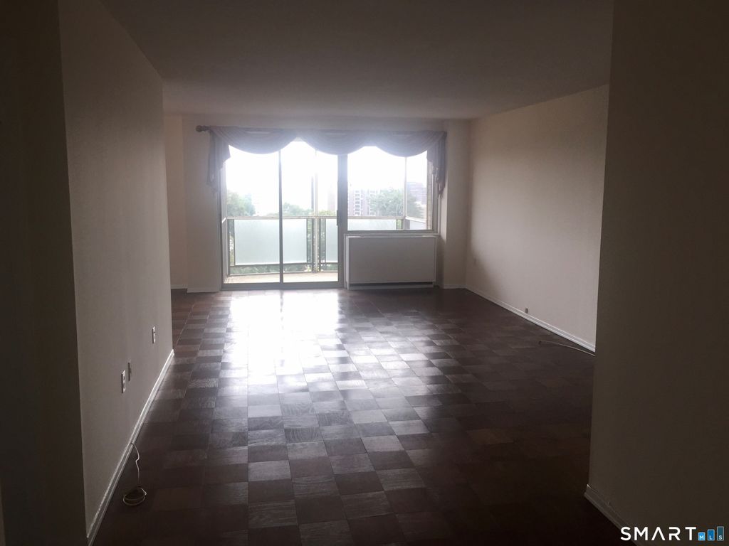 Photo of 1 Strawberry Hill Court #8J, Stamford, CT 06902 (MLS # 24169698)