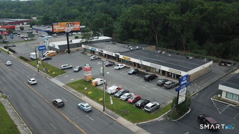 Photo of 741 Wolcott Street, Waterbury, CT 06705 (MLS # 24145012)