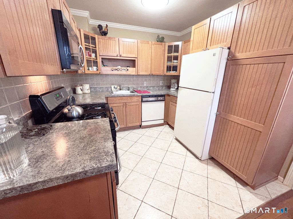 Photo of 11 Bedford Avenue #APT G1, Norwalk, CT 06850 (MLS # 24148214)