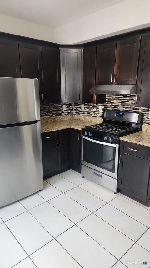 Photo of 67 Beardsley Park Terrace #2nd & 3rd Fls., Bridgeport, CT 06610 (MLS # 24159057)