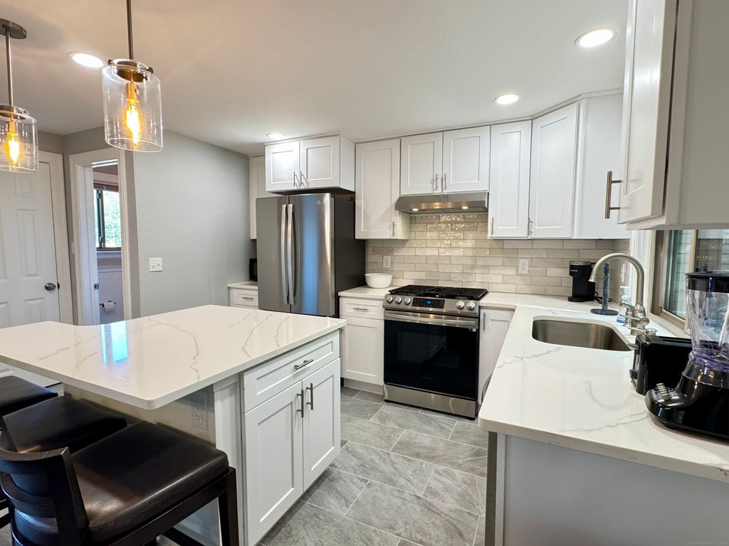 Photo of 44 Powder Mill Road #C, Stratford, CT 06614 (MLS # 24135917)