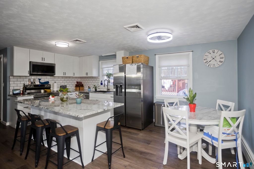 Photo of 7 Bobolink Lane, Enfield, CT 06082 (MLS # 24158872)