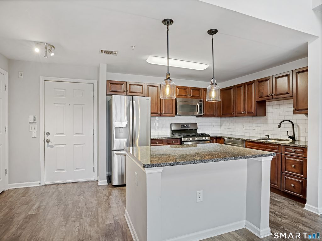 Photo of 35 W Broad Street #404, Stamford, CT 06902 (MLS # 24179224)