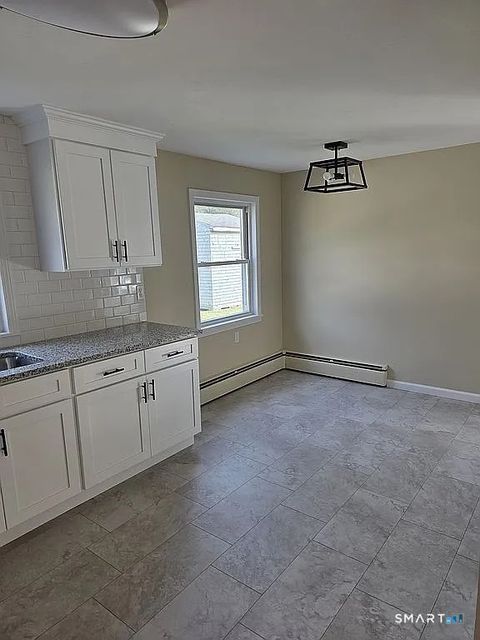 Tiny photo for 70 Bristol Road, Windsor Locks, CT 06096 (MLS # 24169305)