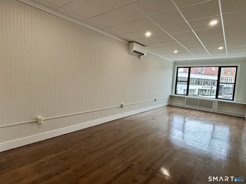 Photo of 19 E. Main Street, Torrington, CT 06790 (MLS # 24148410)