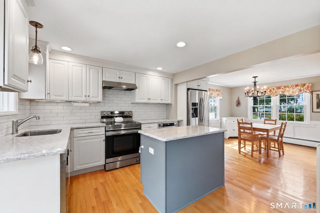 Photo of 394 Wolcott Hill Road, Wethersfield, CT 06109 (MLS # 24207112)