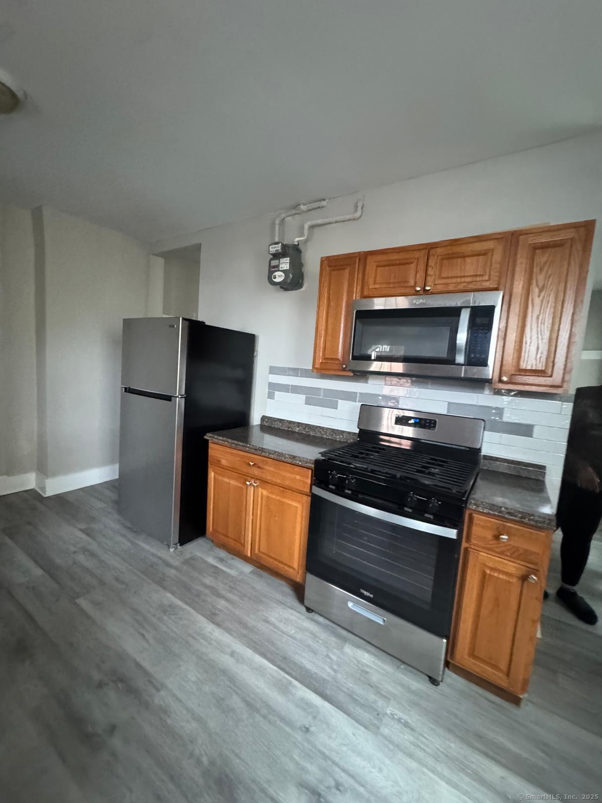 Rental Property at George Street 1A, Bridgeport, Connecticut - Bedrooms: 3 
Bathrooms: 1 
Rooms: 6  - $2,350 MO.