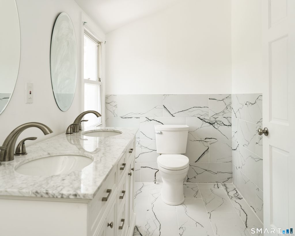 Photo of 103 Baltimore Street, Hartford, CT 06112 (MLS # 24146226)