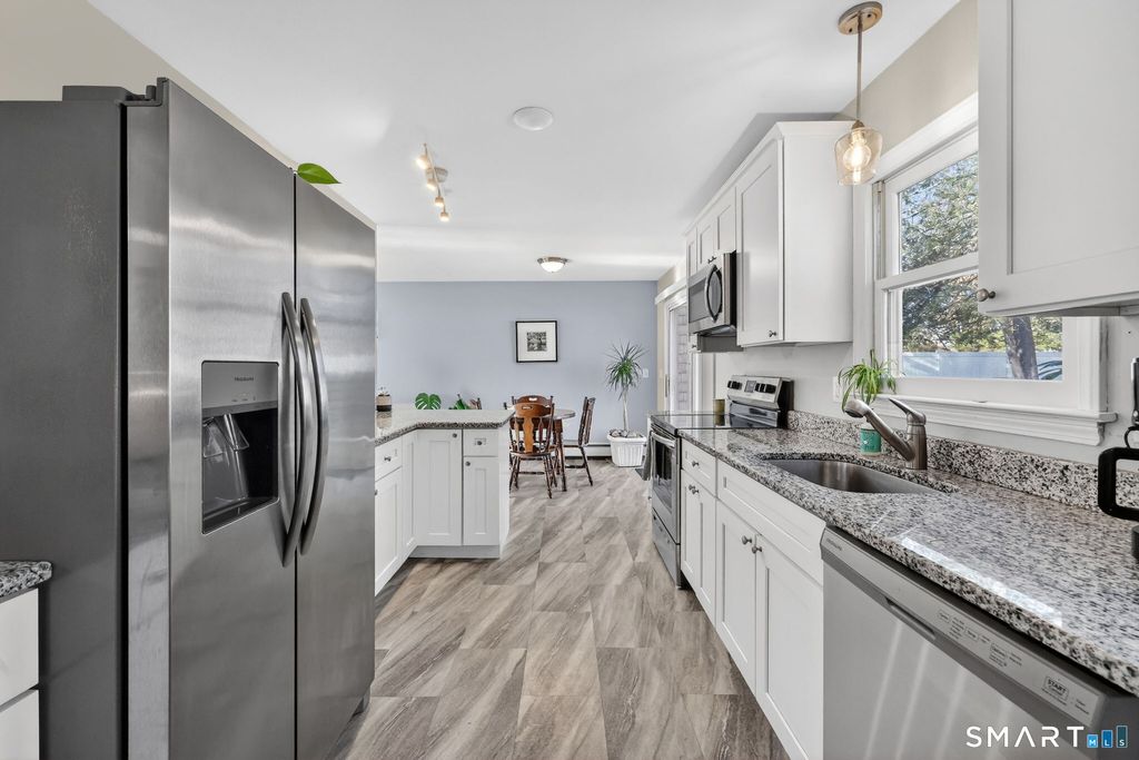 Photo of 55 Woodbridge Road, Glastonbury, CT 06033 (MLS # 24144292)