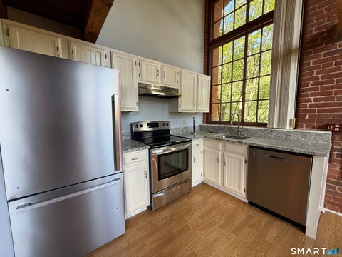 Photo of 839 Main Street #112, Torrington, CT 06790 (MLS # 24206922)