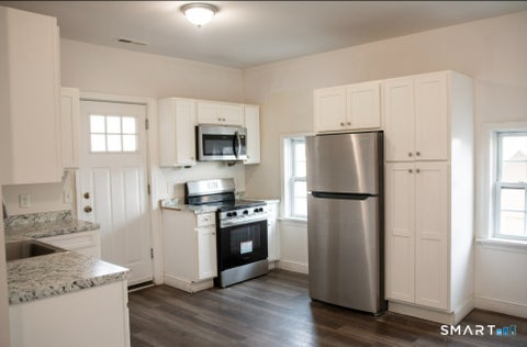 Photo of 22 Brewster Street #2nd Flr, Waterbury, CT 06704 (MLS # 24197953)