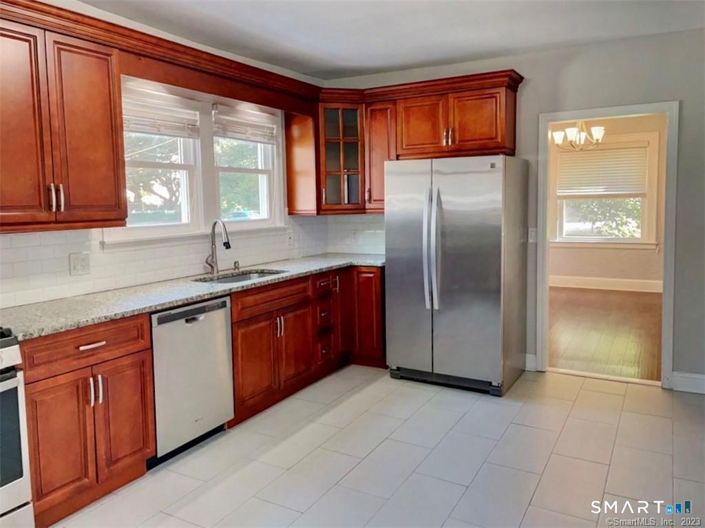 Photo of 203 Toms Road, Stamford, CT 06906 (MLS # 24197459)