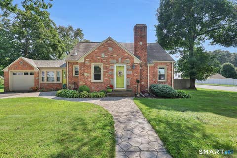 Photo of 200 Woodland Street, Manchester, CT 06042 (MLS # 24200646)