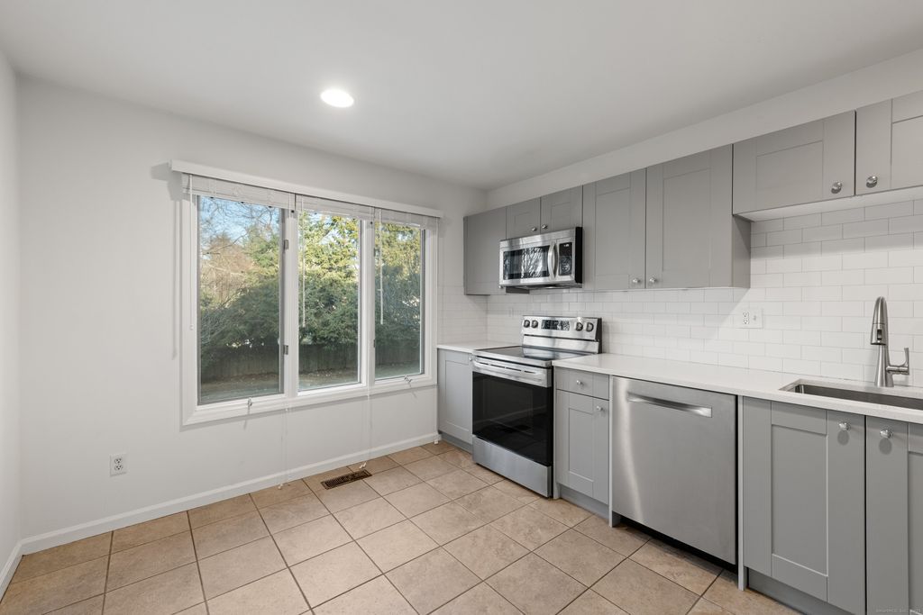 Photo of 65 Wolfpit Avenue #APT 5C, Norwalk, CT 06851 (MLS # 24139488)