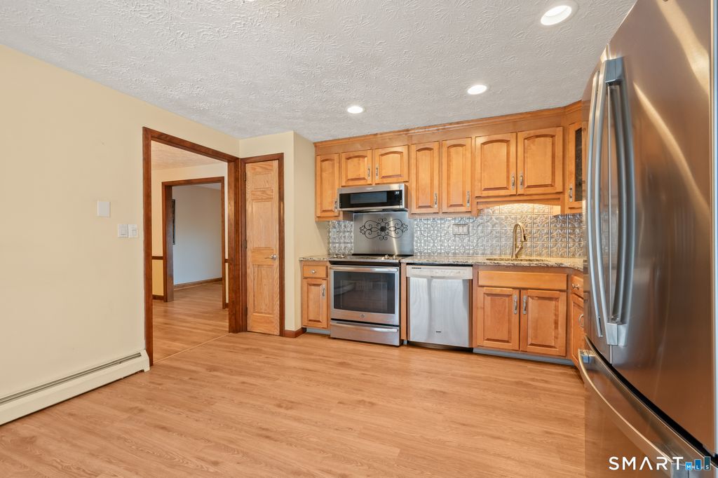 Photo of 42 John Marshall Drive, Glastonbury, CT 06033 (MLS # 24147066)